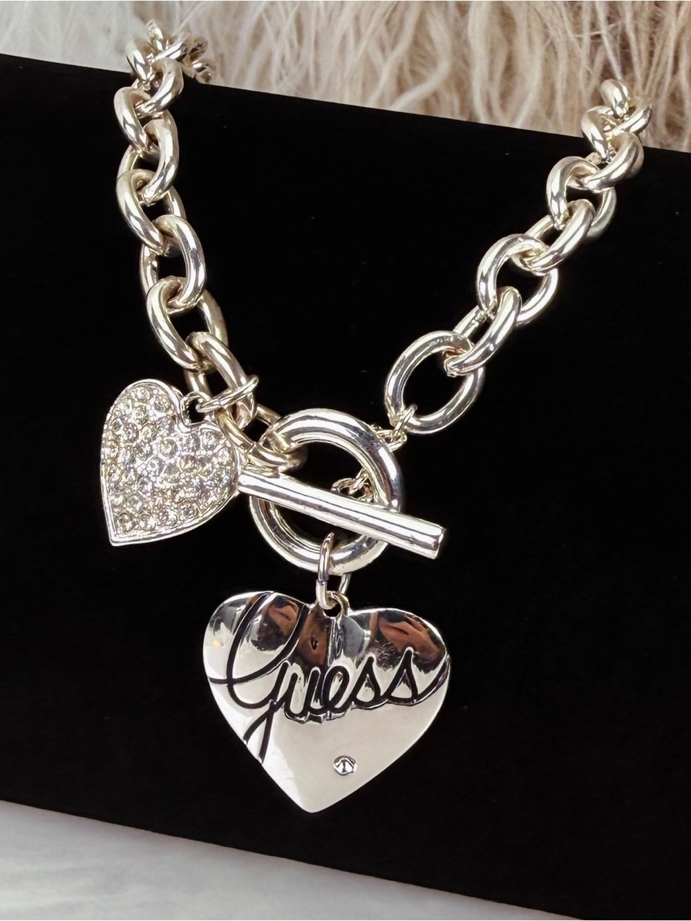 GUESS Silvertone Heart Charms Toggle Necklace with Crystal Accent